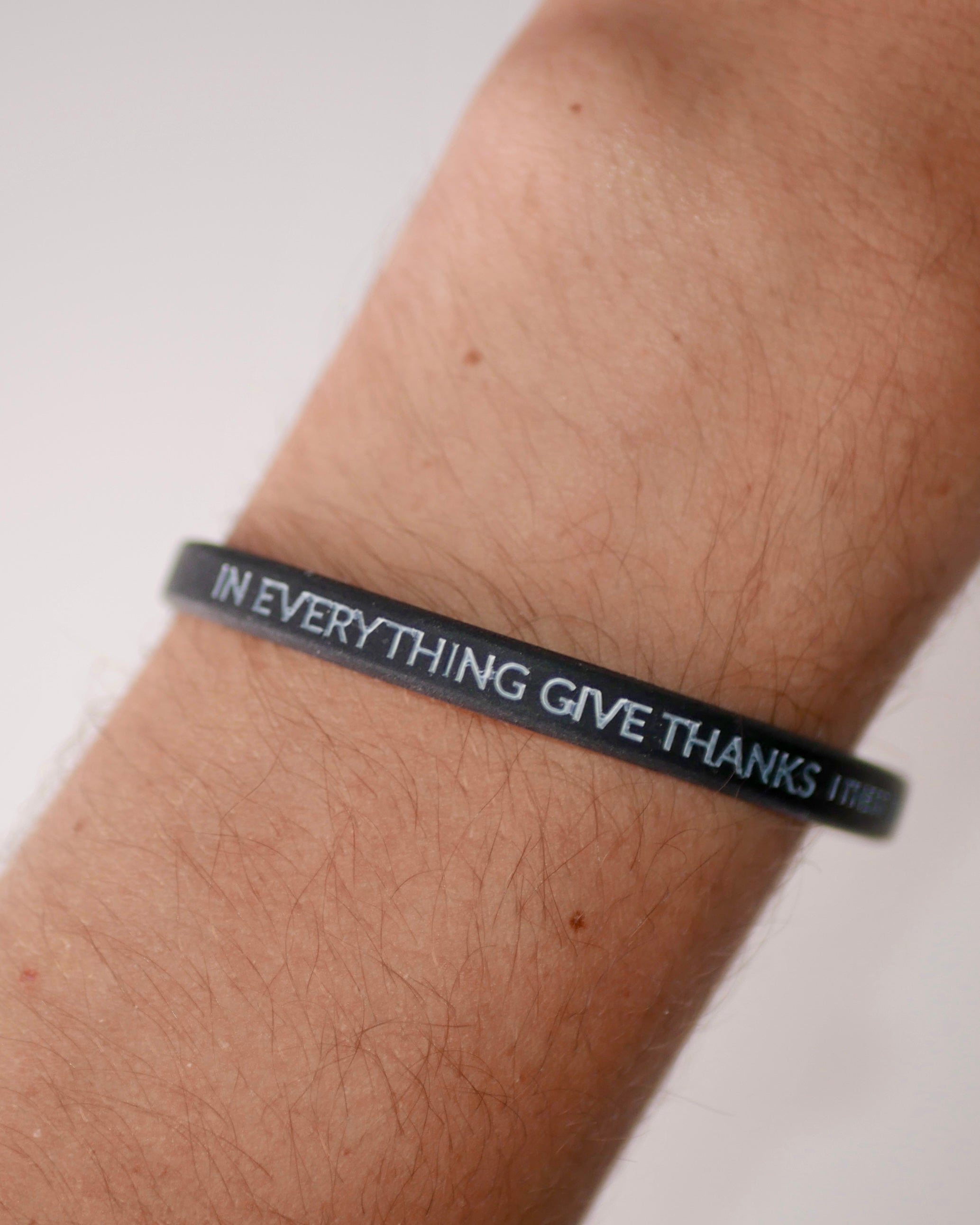Faith-based wristband bundle from Thank God - EVANGELISM WRISTBAND BUNDLE photo on wrist