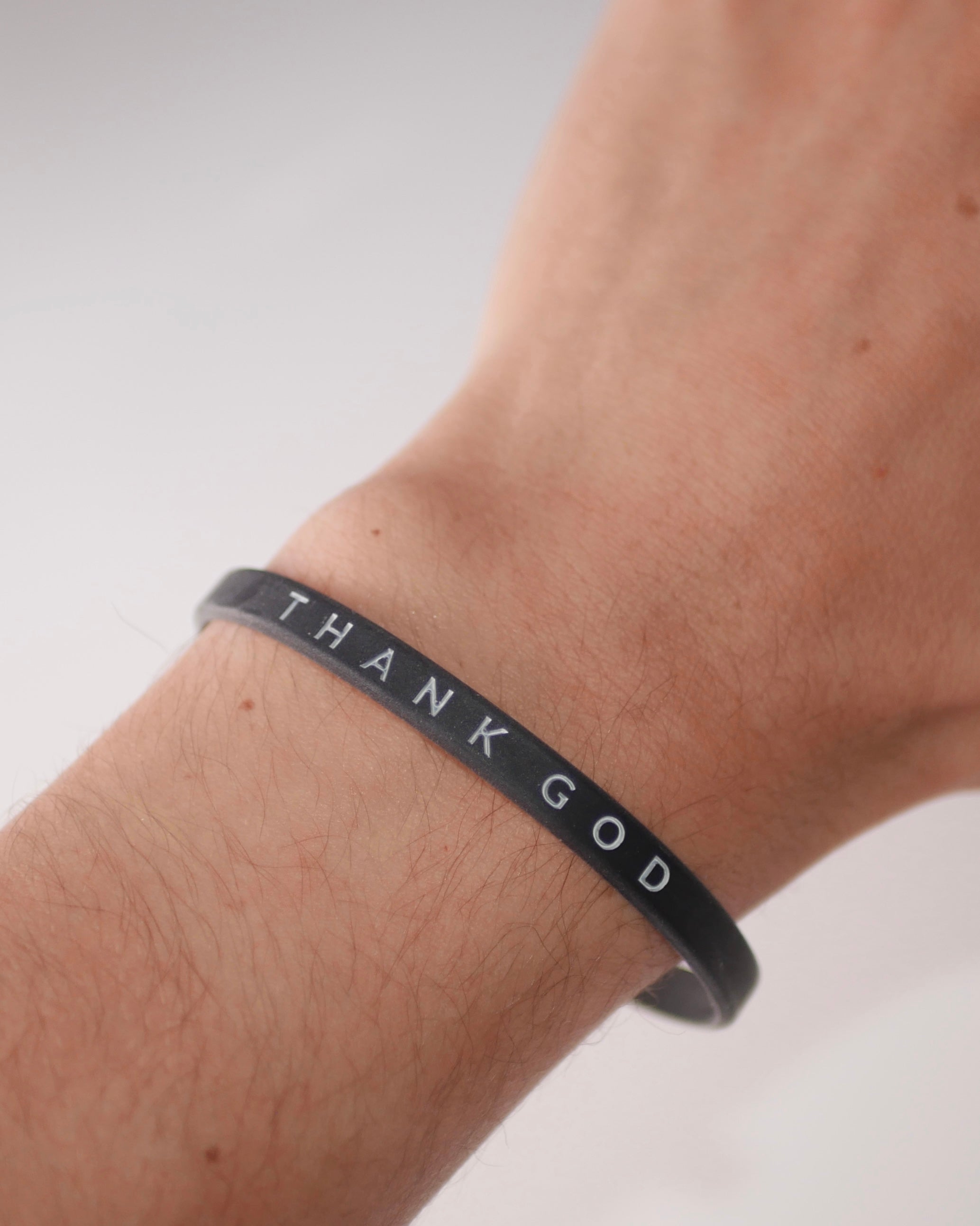 Faith-based wristband bundle from Thank God - EVANGELISM WRISTBAND BUNDLE photo on wrist