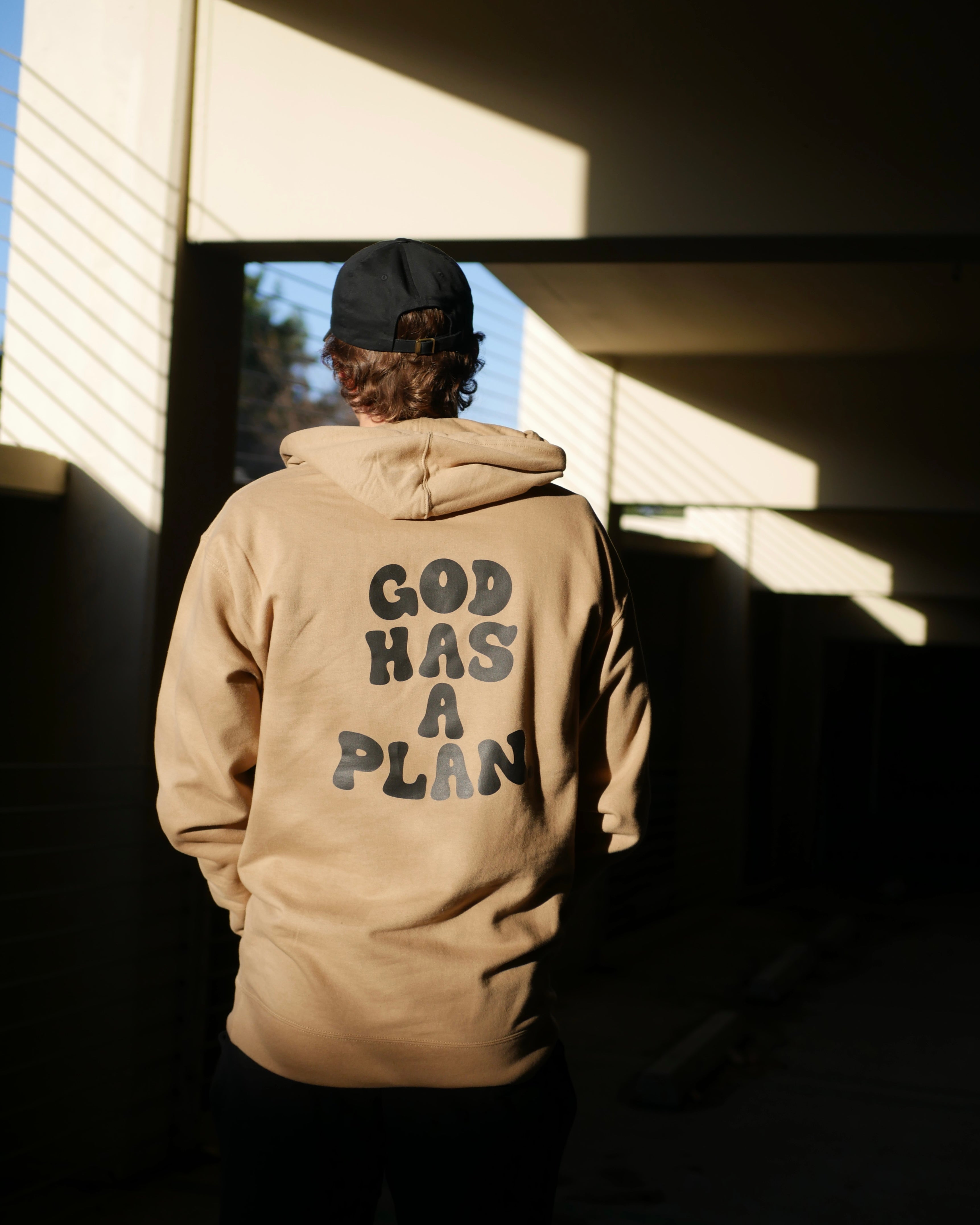 beige back logo shot GOD HAS A PLAN PREMIUM STRINGLESS HOODIE Faith-based Christian hoodie by Thank God with unique GOD HAS A PLAN PREMIUM STRINGLESS HOODIE design