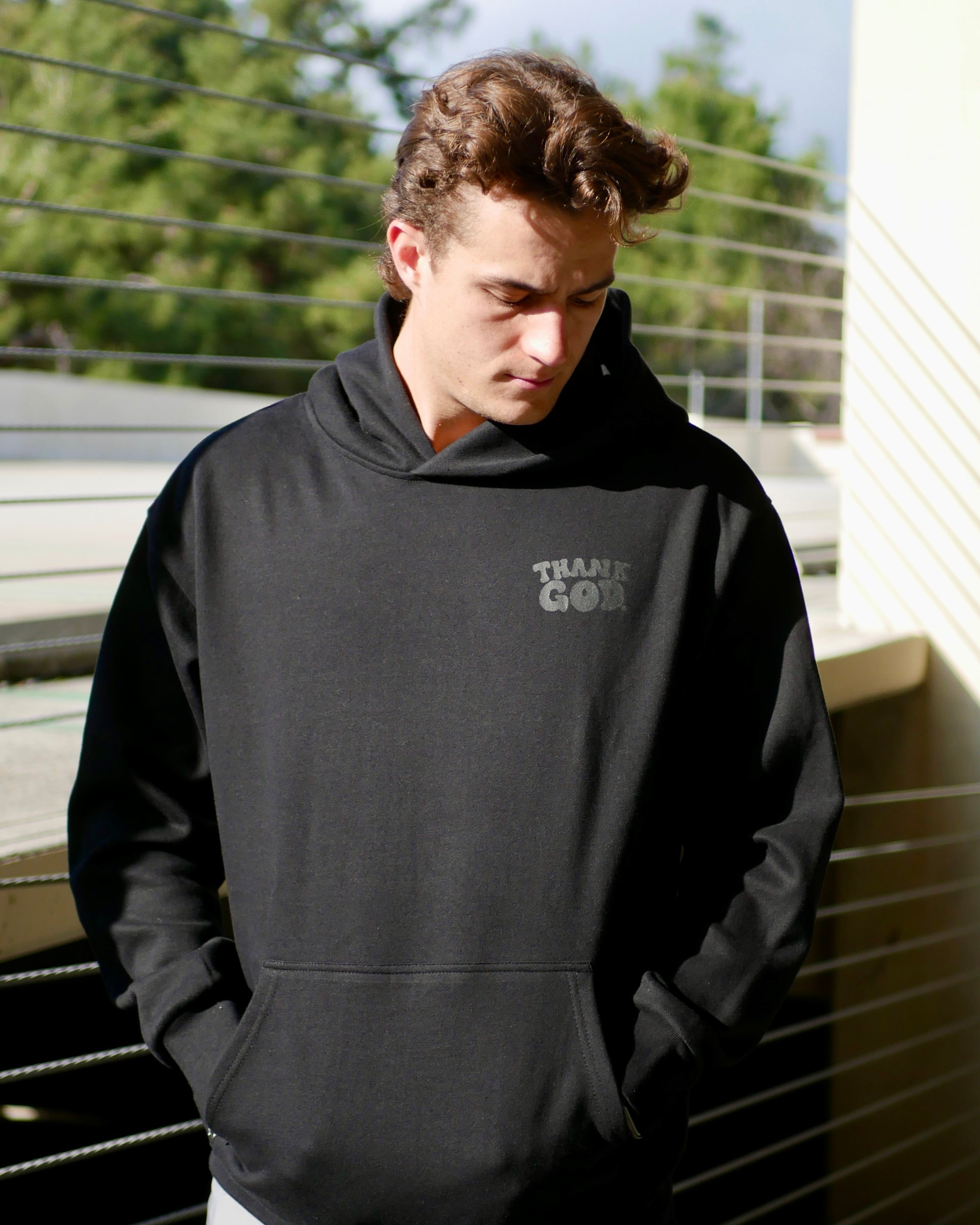 black on black front logo GOD HAS A PLAN PREMIUM STRINGLESS HOODIE Faith-based Christian hoodie by Thank God with unique GOD HAS A PLAN PREMIUM STRINGLESS HOODIE design