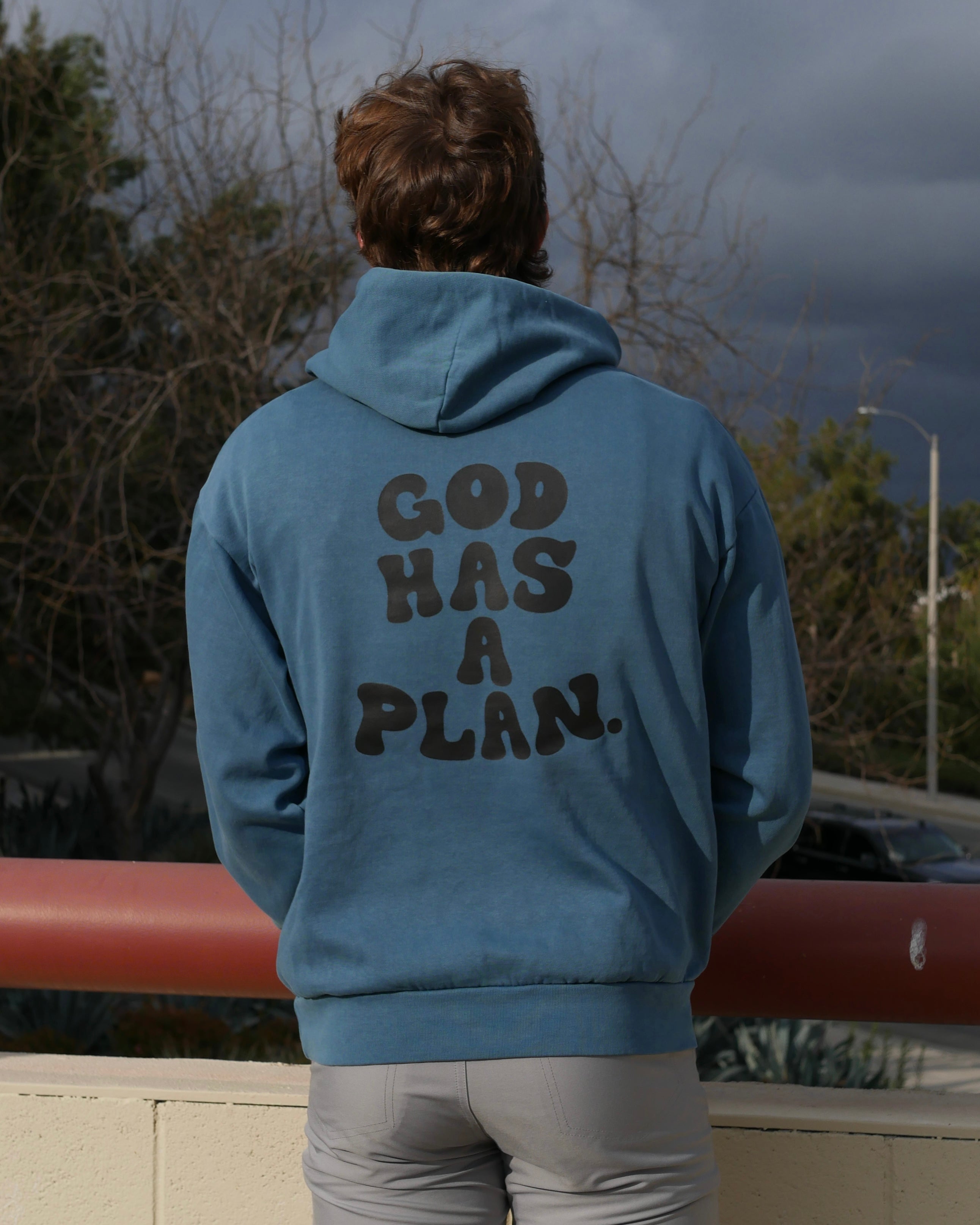 blue back logo shot GOD HAS A PLAN PREMIUM STRINGLESS HOODIE Faith-based Christian hoodie by Thank God with unique GOD HAS A PLAN PREMIUM STRINGLESS HOODIE design