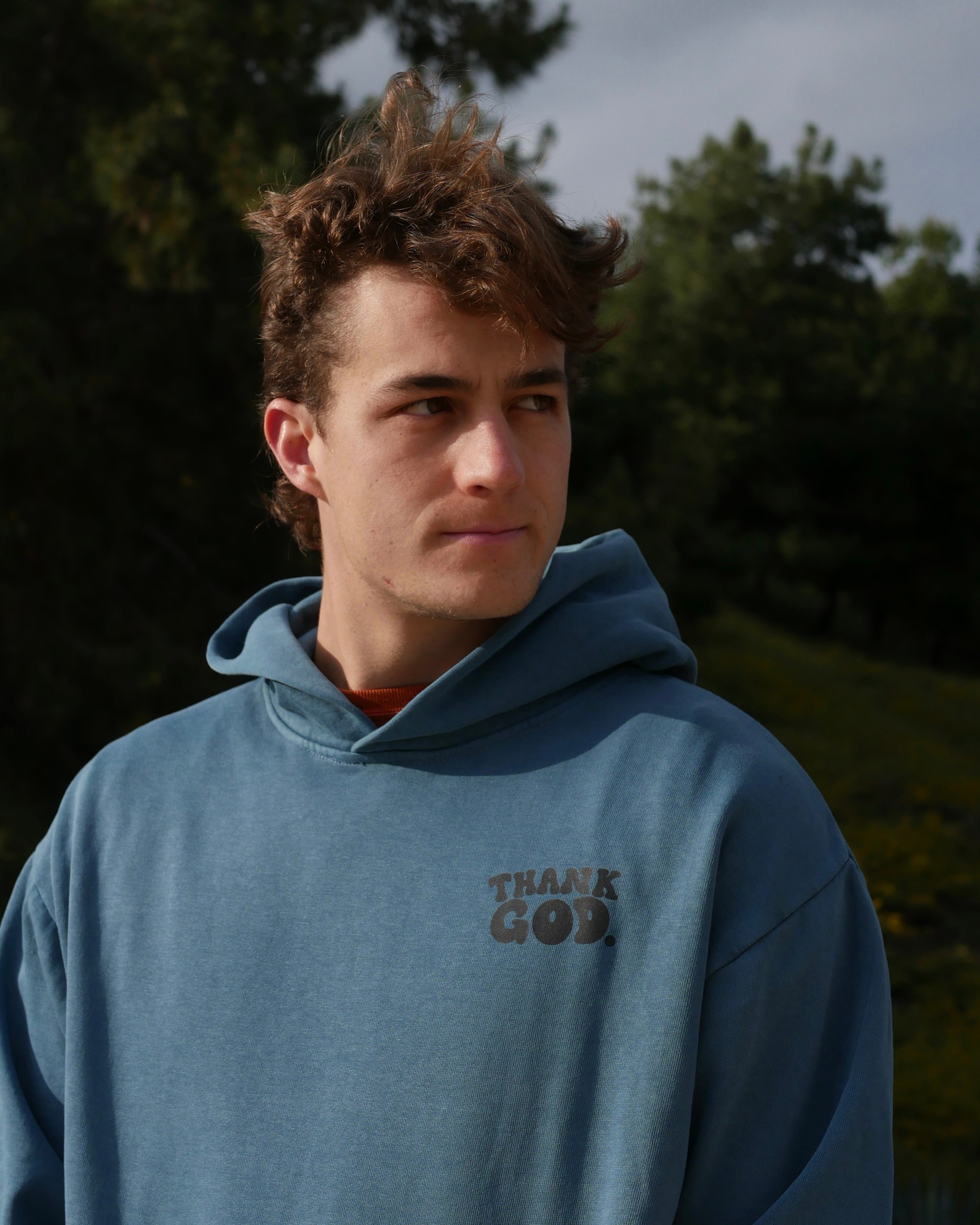 blue front logo shot GOD HAS A PLAN PREMIUM STRINGLESS HOODIE Faith-based Christian hoodie by Thank God with unique GOD HAS A PLAN PREMIUM STRINGLESS HOODIE design