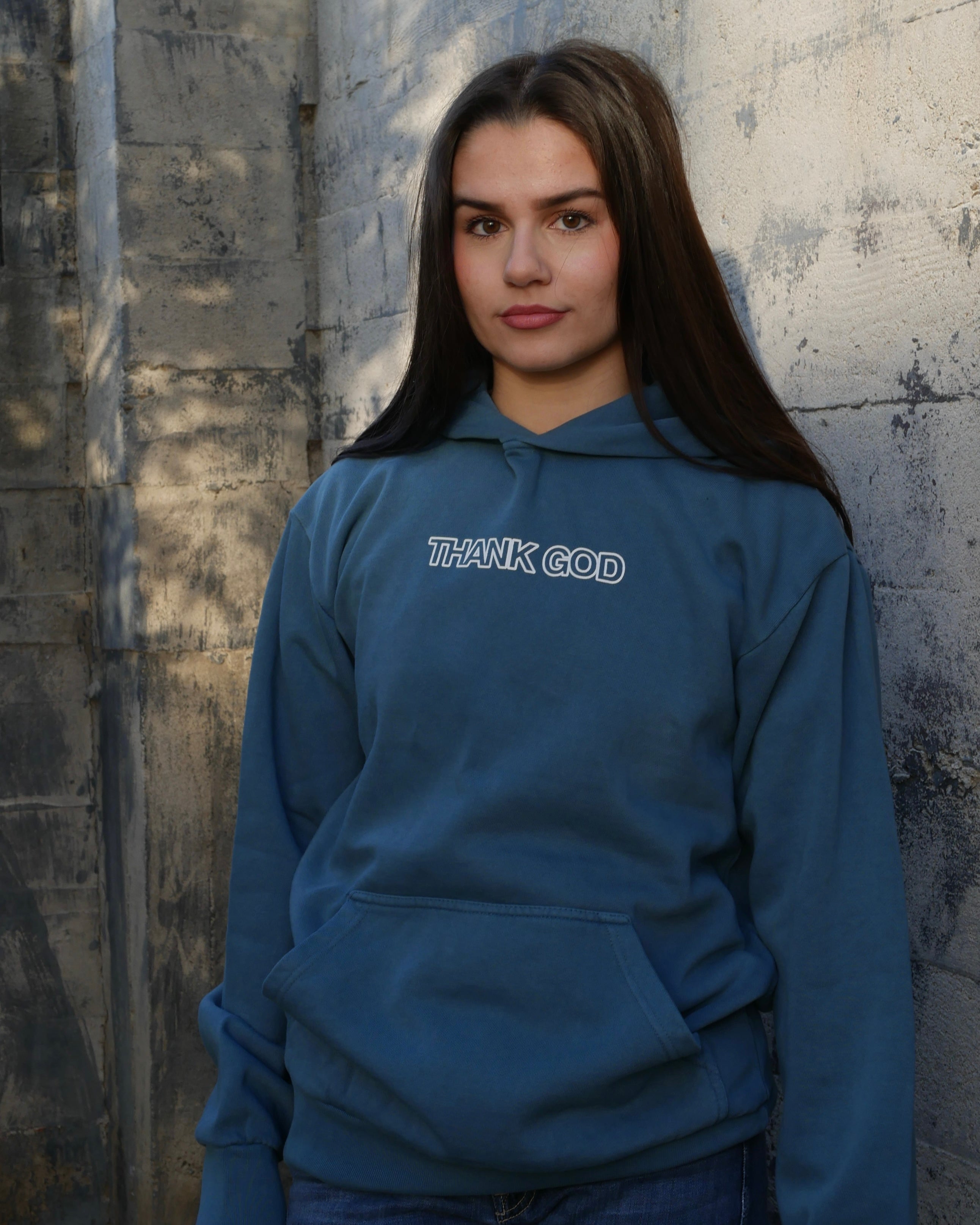 blue front mid range shot IN GOD'S HANDS HOODIE Faith-based Christian hoodie by Thank God with unique IN GOD'S HANDS HOODIE design